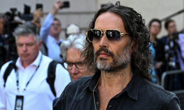 UK comedian Russell Brand appears in court on rape charges
