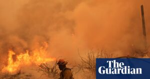 Colorado prison evacuated as wildfire becomes one of largest in state history
