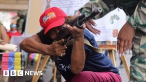 Venezuela tensions rise, Maduro trains civilians for