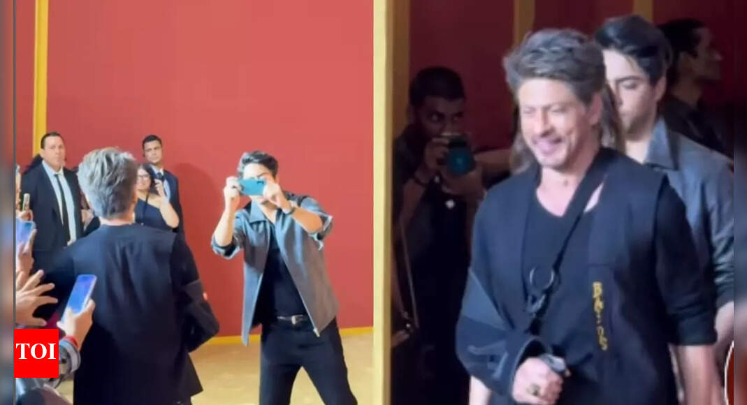 Shah Rukh Khan poses with the paparazzi, burying the hatchet; Aryan Khan captures the moment, netizens react – WATCH VIDEO